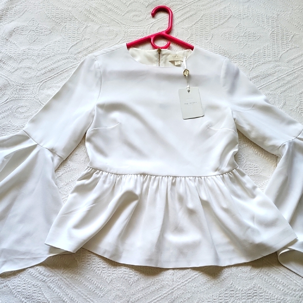 Elegant White Peplum Top